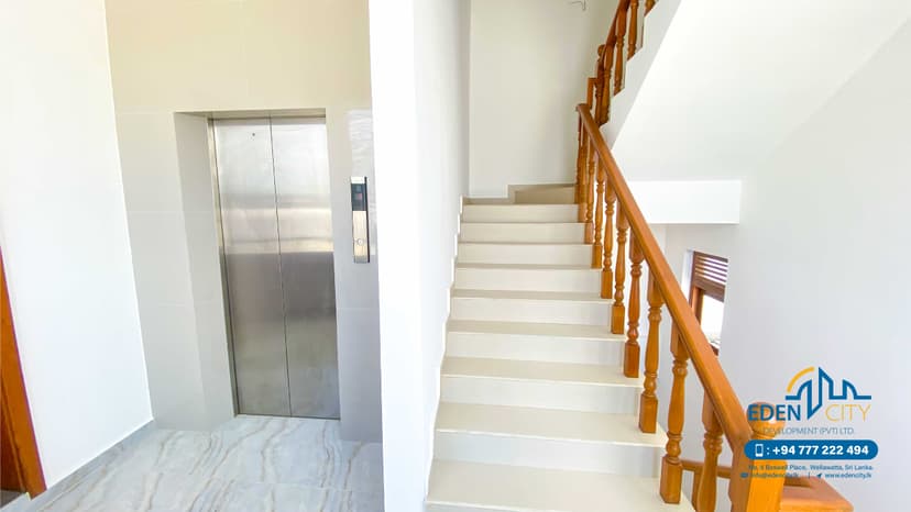 House at Janaki Lane - interior staircase and elevator lobby